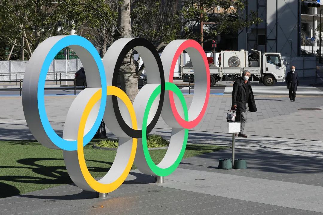 人民日报：赛事停摆推倒的多米诺骨牌 重启后挑战更多_奥运会